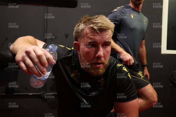 130625 - Picture shows the Welsh Rugby team during extreme heat training, where the air temperature was 388 degrees celsius and 857 humidity - Garyn Phillips during training