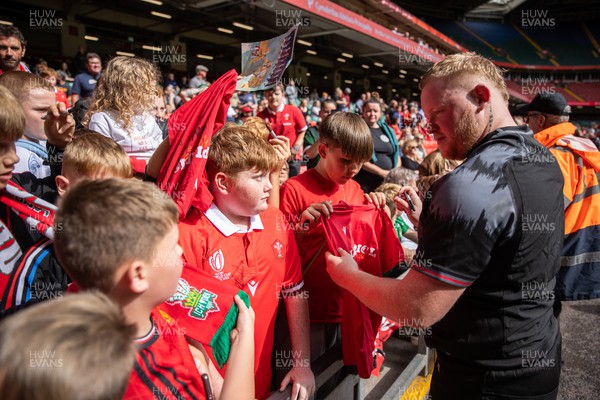 070823 - Wales Rugby Open Training to the public at the Principality Stadium - Keiron Assiratti signs autographs 