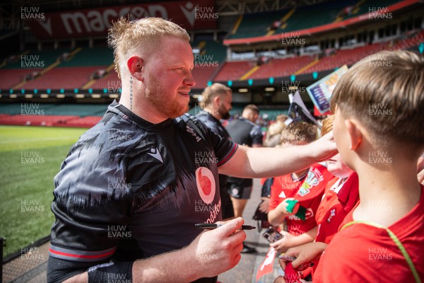 070823 - Wales Rugby Open Training to the public at the Principality Stadium - Keiron Assiratti signs autographs 