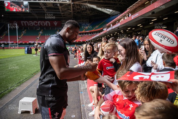 070823 - Wales Rugby Open Training to the public at the Principality Stadium - Christ Tshiunza signs autographs 