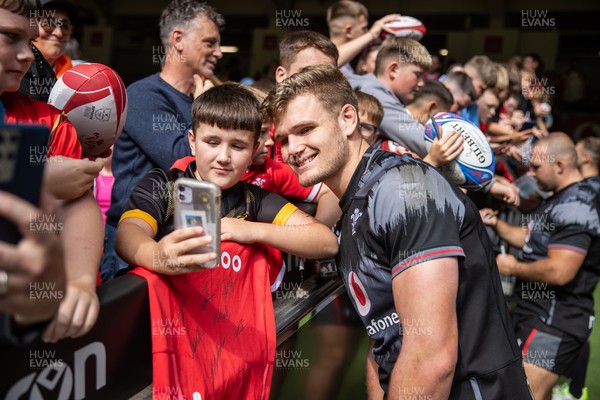 070823 - Wales Rugby Open Training to the public at the Principality Stadium - Taine Plumtree signs autographs 