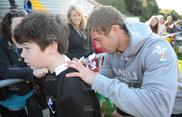 04.09.11 - Wales Rugby Training - Leigh Halfpenny signs autographs during an open training. 