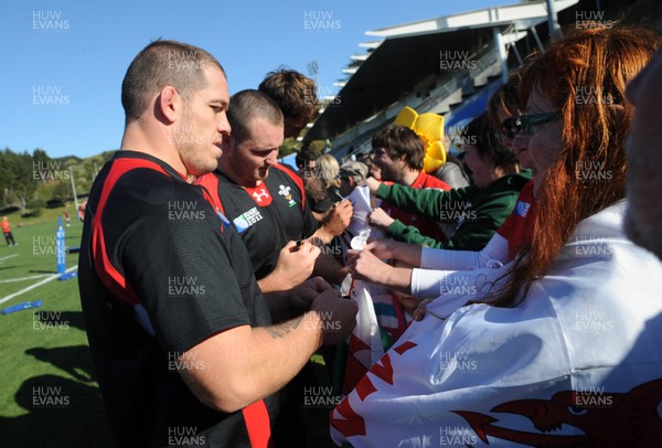 04.09.11 - Wales Rugby Training - Paul James signs autographs during an open training. 
