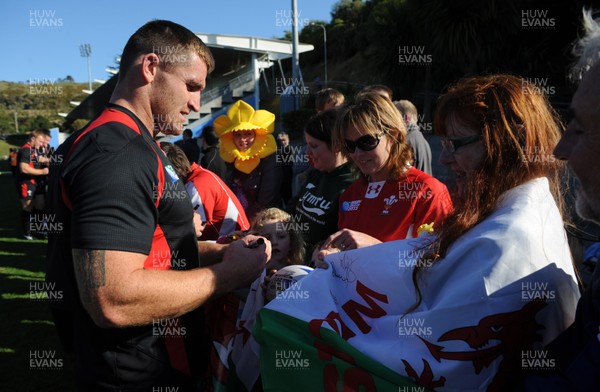 04.09.11 - Wales Rugby Training - Huw Bennett signs autographs during an open training. 