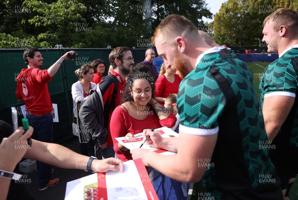 290923 - Wales Rugby hold an Open Training Session - Tommy Reffell with fans after training