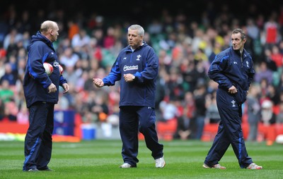 29.10.10 - Wales Rugby Training - Wales head coach Warren Gatland, kicking coach Neil Jenkins(L) and attack coach Rob Howley during training. 