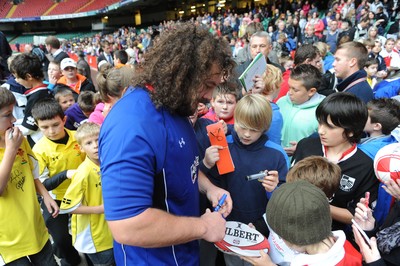 29.10.10 - Wales Rugby Training - Adam Jones signs autographs. 