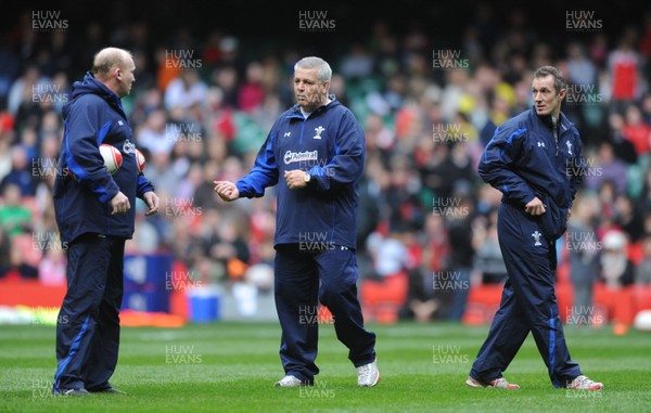 29.10.10 - Wales Rugby Training - Wales head coach Warren Gatland, kicking coach Neil Jenkins(L) and attack coach Rob Howley during training. 