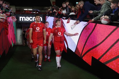 291025 - Wales Rugby Open Training - Dafydd Jenkins and Jac Morgan walk out of the tunnel