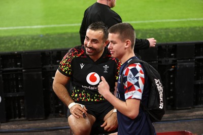 291025 - Wales Rugby Open Training - Liam Belcher during fan signing