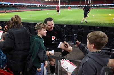 291025 - Wales Rugby Open Training - Tom Rogers during fan signing