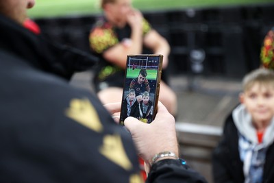 291025 - Wales Rugby Open Training - Louie Hennessey during fan signing