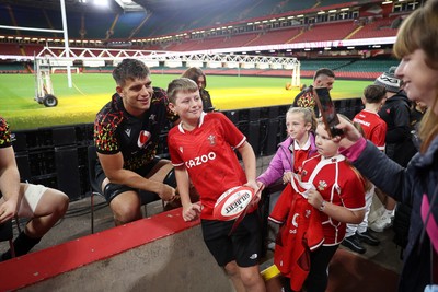 291025 - Wales Rugby Open Training - Dafydd Jenkins during fan signing