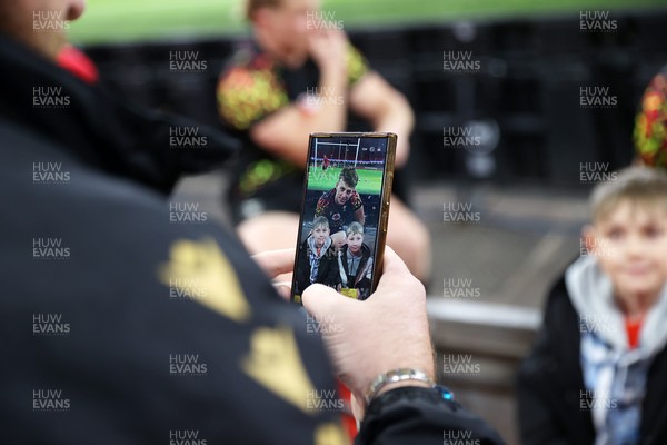 291025 - Wales Rugby Open Training - Louie Hennessey during fan signing