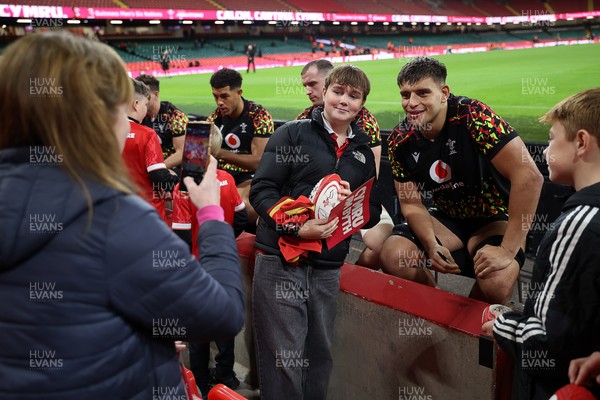 291025 - Wales Rugby Open Training - Dafydd Jenkins during fan signing