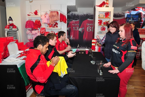 070312- Wales Rugby Players Signing Session Wales Players Ryan Jones, Jonathan Davies and Toby Faletau, meet fans and sign autographs at the Cardiff Arms Shop and Bar
