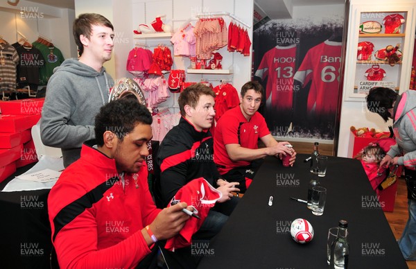 070312- Wales Rugby Players Signing Session Wales Players Ryan Jones, Jonathan Davies and Toby Faletau, meet fans and sign autographs at the Cardiff Arms Shop and Bar