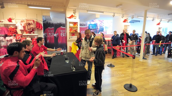 070312- Wales Rugby Players Signing Session Wales Players Ryan Jones, Jonathan Davies and Toby Faletau, meet fans and sign autographs at the Cardiff Arms Shop and Bar