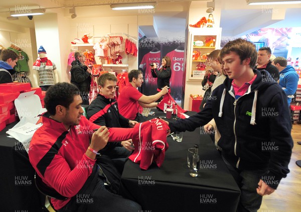 070312- Wales Rugby Players Signing Session Wales Players Ryan Jones, Jonathan Davies and Toby Faletau, meet fans and sign autographs at the Cardiff Arms Shop and Bar