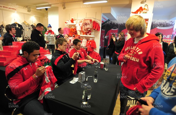 070312- Wales Rugby Players Signing Session Wales Players Ryan Jones, Jonathan Davies and Toby Faletau, meet fans and sign autographs at the Cardiff Arms Shop and Bar