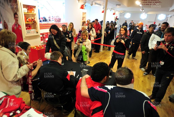 070312- Wales Rugby Players Signing Session Wales Players Ryan Jones, Jonathan Davies and Toby Faletau, meet fans and sign autographs at the Cardiff Arms Shop and Bar