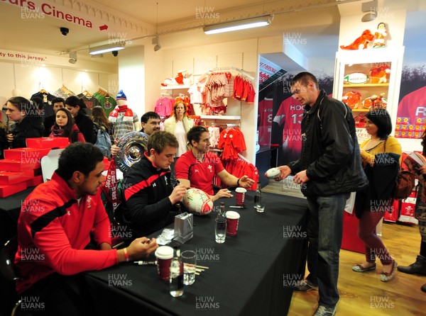 070312- Wales Rugby Players Signing Session Wales Players Ryan Jones, Jonathan Davies and Toby Faletau, meet fans and sign autographs at the Cardiff Arms Shop and Bar