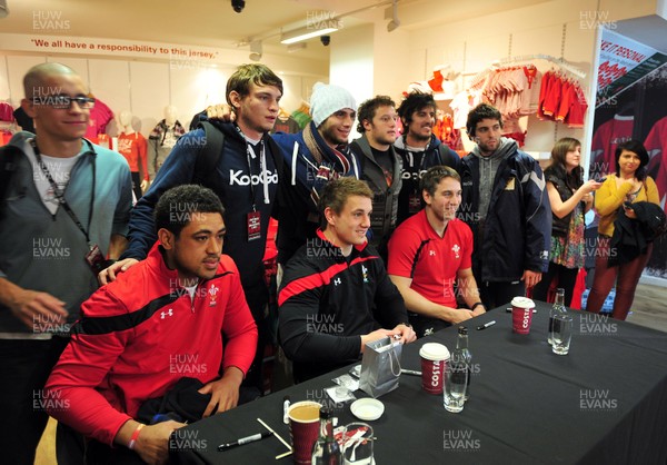 070312- Wales Rugby Players Signing Session Wales Players Ryan Jones, Jonathan Davies and Toby Faletau, meet fans and sign autographs at the Cardiff Arms Shop and Bar