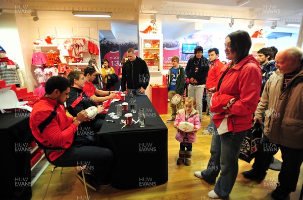 070312- Wales Rugby Players Signing Session Wales Players Ryan Jones, Jonathan Davies and Toby Faletau, meet fans and sign autographs at the Cardiff Arms Shop and Bar