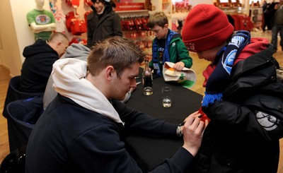 19.02.11 - Wales Rugby Players Signing Session - Wales players Dan Lydiate, Sam Warburton and John Yapp meet fans during a signing session at the Cardiff Arms Shop and Bar. 