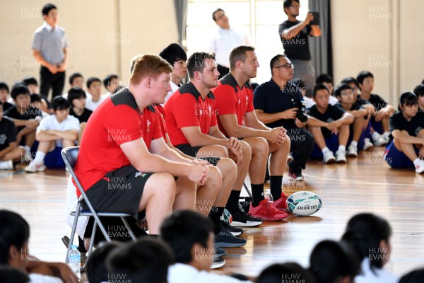 200919 - Wales Rugby School Visit - Rhys Carre, Ryan Elias and Hadleigh Parkes during a visit to Toyota Solakan Junior School