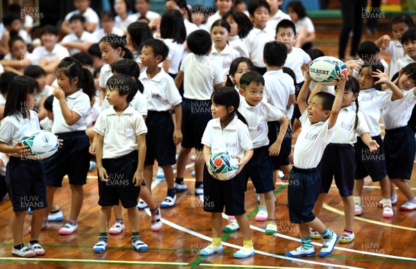170919 - Wales Rugby Players Visit Local School in Kitakyushu - School children during a visit from Wales squad members