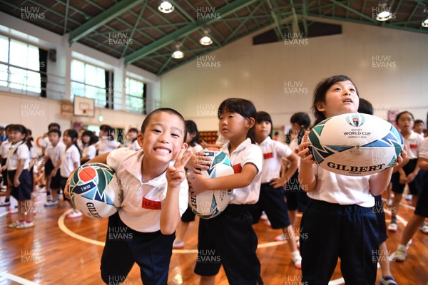 170919 - Wales Rugby Players Visit Local School in Kitakyushu - School children during a visit from Wales squad members