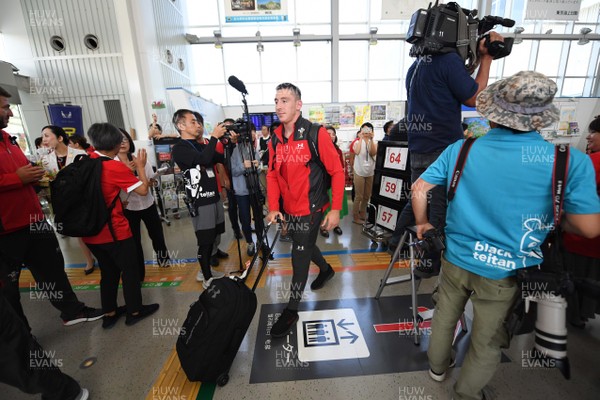 140919 - Wales Rugby Squad Arrive in Kitakyushu - Josh Adams meets locals after arriving in Kitakyushu