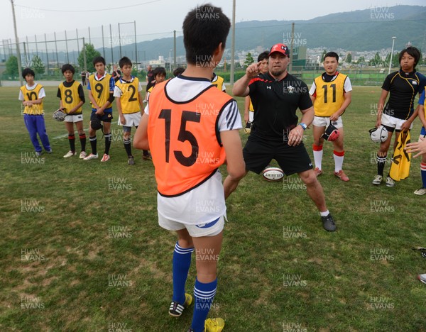 060613 - Wales Rugby Squad Coach Japanese Children -Dan Baugh during training with Japanese Children