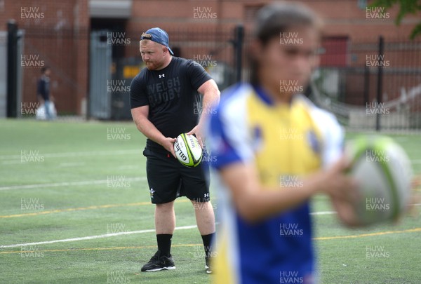 310518 - Wales Rugby Squad Coaching Children in Local Community - Samson Lee coaching local school children in Washington DC