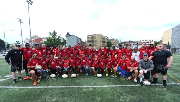 310518 - Wales Rugby Squad Coaching Children in Local Community - Shaun Edwards, Rhys Patchell and Samson Lee coaching local school children in Washington DC