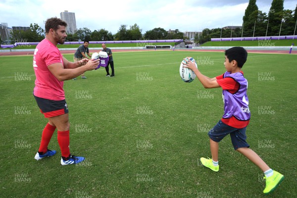 041019 - Wales Rugby Squad Members Coaching Local School Children - Leigh Halfpenny during a coaching session with local school children