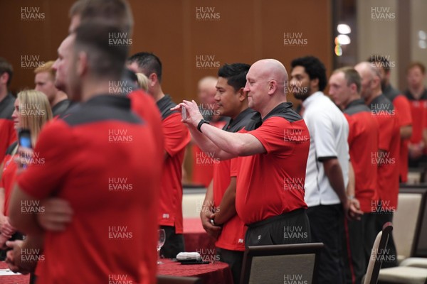 150919 - Wales Rugby Squad Welcome to Kitakyushu Ceremony - Shaun Edwards takes a picture