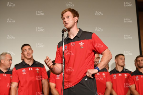 150919 - Wales Rugby Squad Welcome to Kitakyushu Ceremony - Rhys Patchell as the Wales squad sing to invited guests