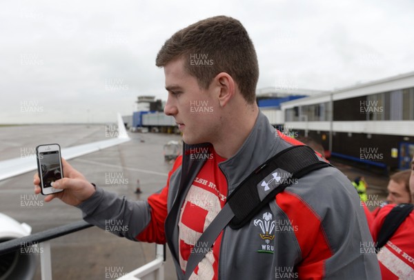 060214 - Wales Rugby - Scott Williams boards the plane at Cardiff Airport on the way to Dublin for the Six Nations match against Ireland