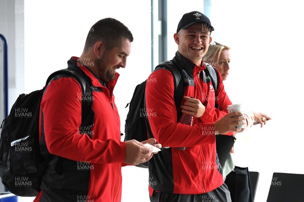 110919 - Wales Rugby Squad Travel to Japan - Wyn Jones and Hallam Amos boards the Wales squad flight to Japan