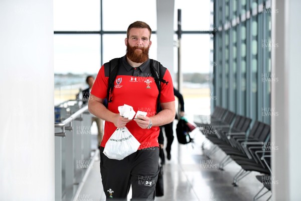 110919 - Wales Rugby Squad Travel to Japan - Jake Ball boards the Wales squad flight to Japan
