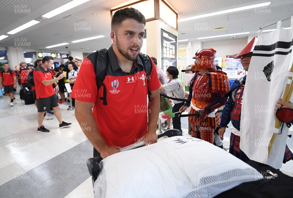 061019 - Wales Rugby Squad Travel to Oita - Nicky Smith arrives in Oita Airport to be greeted by local people