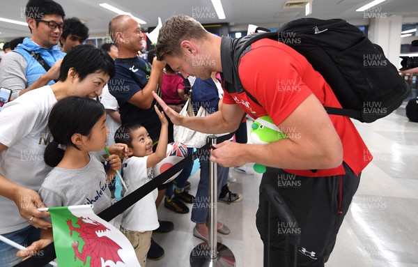 061019 - Wales Rugby Squad Travel to Oita - Dan Biggar arrives in Oita Airport to be greeted by local people