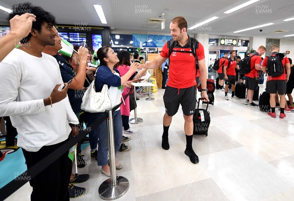 061019 - Wales Rugby Squad Travel to Oita - Alun Wyn Jones arrives in Oita Airport to be greeted by local people