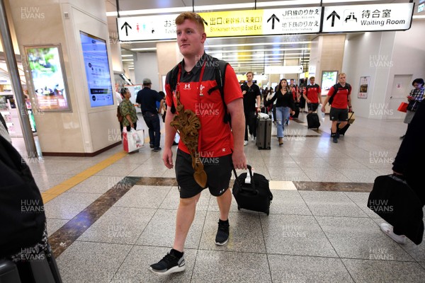 300919 - Wales Rugby Squad Travel to Otsu - Rhys Carre after arriving in Otsu