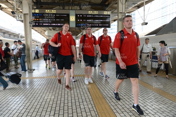 090613 - Wales Squad Travel to Tokyo -Bradley Davies, Rob McCusker, Lou Reed and Tavis Knoyle get off a bullet train after arriving in Tokyo