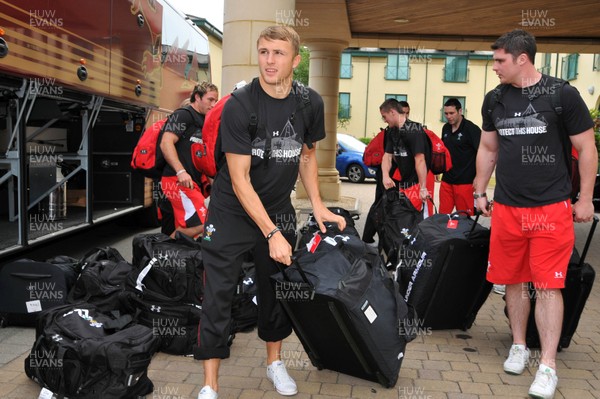 28.06.10 -Wales Rugby team The Wales rugby team arrive back at the Vale Hotel, after their summer tour of New Zealand. Tom Prydie collects his bag.  