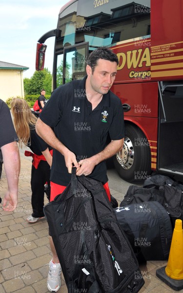 28.06.10 -Wales Rugby team The Wales rugby team arrive back at the Vale Hotel, after their summer tour of New Zealand.  Stephen Jones collects his bags 