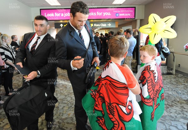 02.09.11 - Wales Rugby Team Arrival - Jamie Roberts is greeted by fans as the Wales team arrive at Wellington airport. 